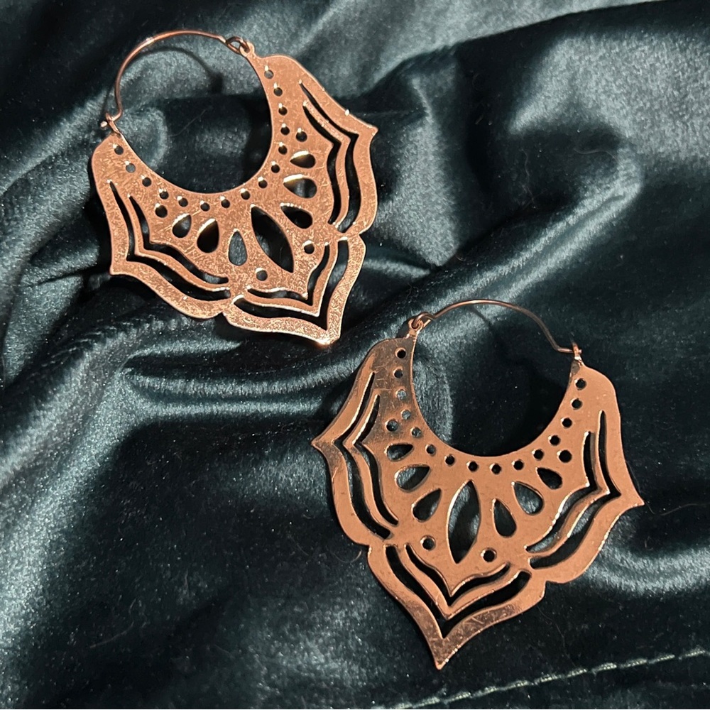 Gold metal statement earrings